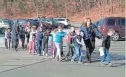  ?? REUTERS ?? Police personnel lead children from Sandy Hook Elementary School, where a gunman killed 26 people, including 20 kids, on Dec. 14, 2012.