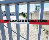  ?? PHOTO: RONALD ZAK ?? Killing:
Police tape at the scene where the man was shot dead in Gerasdorf, Austria.
