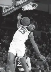  ?? ASSOCIATED PRESS ?? ARIZONA STATE FORWARD Romello White (23) gets hit by the ball after a dunk against Colorado during the second half of Saturday’s game in Tempe.BIG PICTURE