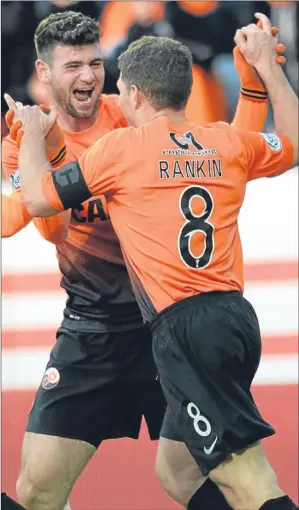  ??  ?? n Dundee United’s John Rankin celebrates after scoring the winning goal.