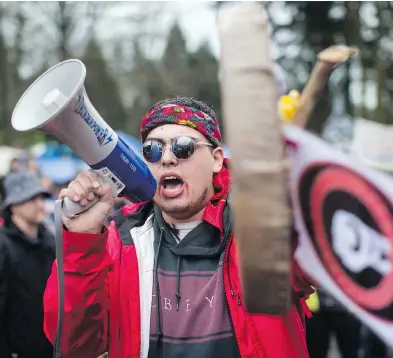  ?? DARRYL DYCK / THE CANADIAN PRESS FILES ?? Cedar George-parker leads a protest this spring for those opposed to the Trans Mountain pipeline expansion. George-parker vows to continue the fight to stop the project, which was bought by the federal government.