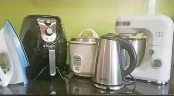  ??  ?? Electrical appliances include iron, air fryer, rice cooker, electrical kettle and mixture.
