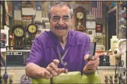  ??  ?? Barber Allen Wanner poses for a photo July 28 after he celebrated his 90th birthday in Mandan, N.D. His DeLuxe Barber Shop in Mandan is open Tuesday through Saturday, the same hours he’s kept since becoming a barber in 1956.
(The Bismarck Tribune/Tom Stromme)