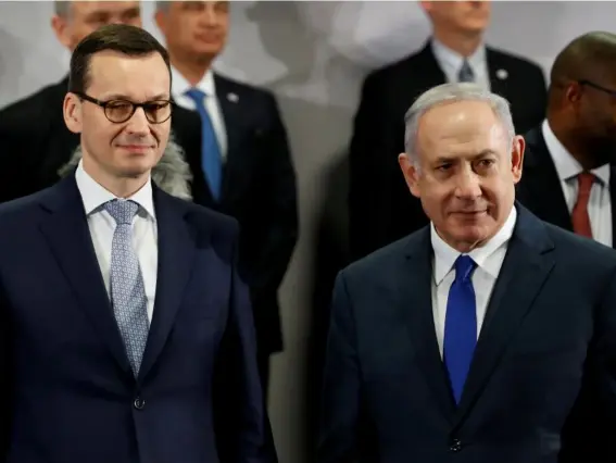  ??  ?? Polish premier Mateusz Morawiecki (left) was due to visit Israel this week (Reuters)