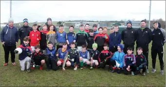  ??  ?? Players and coaches at the GAA camps in Scarden.