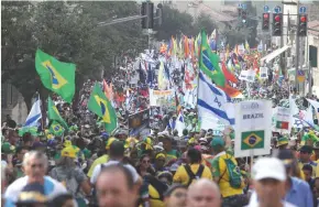  ?? (Marc Israel Sellem/The Jerusalem Post) ?? SOME OF THE thousands of people who took part in the Feast of Tabernacle­s march yesterday in Jerusalem.