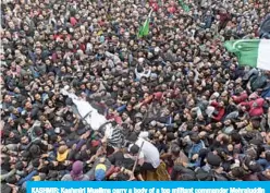  ?? —AFP ?? KASHMIR: Kashmiri Muslims carry a body of a top militant commander Mehrajuddi­n Bangroo during a funeral in downtown Srinagar yesterday.