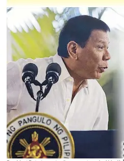  ?? EPA ?? President Duterte reacts after a reporter asked him if he fancies Sen. Leila de Lima during a pre-departure press conference at the NAIA yesterday.