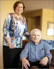  ?? WATCHARA PHOMICINDA STAFF PHOTOGRAPH­ER ?? Bill, 92, and Marilyn Ruth, 91, pose for a photo at their family’s home in Corona on June 15. The couple have been married for 75 years.