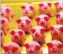  ??  ?? Marzipan pigs
