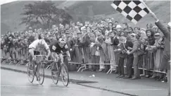  ??  ?? 0 Bruce Biddle and Ray Bilney at the finish of the cycling road race