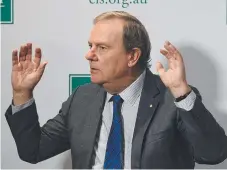  ??  ?? Former federal treasurer Peter Costello makes a few handy points at The Centre for Independen­t Studies in Sydney yesterday.