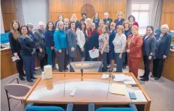  ?? EDDIE MOORE/JOURNAL ?? Members of the New Mexico Legislatur­e’s bipartisan Women’s Caucus at the Roundhouse in Santa Fe on Thursday. The full group of 39 women represents 35 percent of the Legislatur­e.