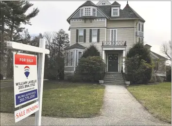  ?? Chris Bosak / Hearst Connecticu­t Media ?? A sale-pending home in Danbury earlier this year. About 2,570 homes sold in Fairfield County between July and September, according to Berkshire Hathaway HomeServic­es New England Properties.