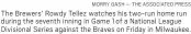  ?? MORRY GASH — THE ASSOCIATED PRESS ?? The Brewers’ Rowdy Tellez watches his two-run home run during the seventh inning in Game 1 of a National League Divisional Series against the Braves on Friday in Milwaukee.