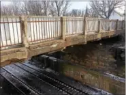  ??  ?? A recent PennDOT inspection found problems with the South Evans Street bridge over the Norfolk Southern tracks.