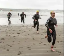  ??  ?? Racing to the finish line at the Swim Series. Pics: Donal Hackett.