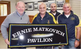  ??  ?? Unveiling the signage for Ellinbank Football Netball Club’s new pavilion are, from left former V8 Supercar driver Jason Bargwanna, Ellinbank Football Netball Club life member Ernie Matkovich, club treasurer John Jacovou and president Rob Pandolfo.