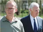  ?? — Reuters ?? Mark Johnson, (L) HSBC’s global head of foreign exchange cash trading in London, exits the Brooklyn federal court in New York.