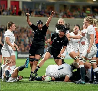  ?? PHOTO: PHOTOSPORT ?? Black Ferns prop Toka Natua is obscured but there’s no doubting she has scored.