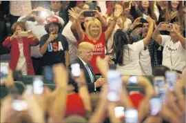  ?? Mark Boster Los Angeles Times ?? “A LOT OF PEOPLE are going to vote for the party nominee, no matter what. They vote for their team color,” one GOP consultant says of Trump backers.