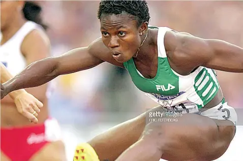  ??  ?? Gloria Alozie competing for Nigeria before she changed nationalit­y in 2001