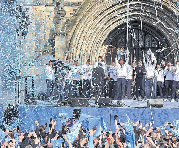  ??  ?? Manchester City players and fans celebrate their Premier League and League Cup wins in 2014.