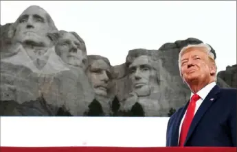  ?? Saul Loeb/AFP via Getty Images ?? President Donald Trump arrives Friday for the Independen­ce Day events at Mount Rushmore National Memorial in Keystone, S.D.