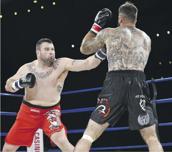  ?? ED KAISER ?? Tim Hague battles Adam Braidwood during the KO 79 boxing event at the Shaw Conference Centre on June 16. Hague died two days later.