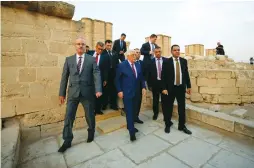  ?? (Reuters) ?? PALESTINIA­N AUTHORITY President Mahmoud Abbas leaves the archaeolog­ical site of Hisham’s Palace after a visit with Russian Prime Minister Dmitry Medvedev in the ancient West Bank city of Jericho.