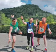  ?? 08_a20jailbre­ak09 ?? Colin MacFarlane, Gillian Tierney-Clerk and Brian Robertson at the finish line.