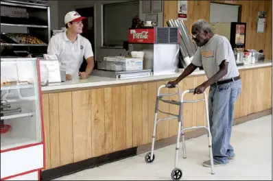  ?? Arkansas Democrat-Gazette/CHEREE FRANCO ?? Employees at Shipley Donuts on Cantrell Road usually offer “Broom Man” Melvin Pickens free coffee and doughnuts.