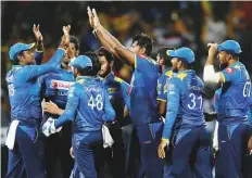  ?? Reuters ?? Sri Lanka’s captain Angelo Mathews celebrates with his teammates after their win over South Africa on Wednesday.