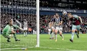  ?? AP ?? Chris Wood stoops to head home Burnley’s winning goal at West Bromwich Albion.