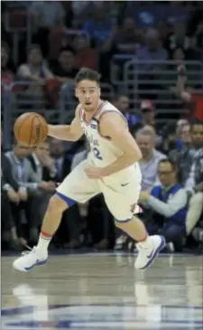  ?? MATT SLOCUM — THE ASSOCIATED PRESS ?? As the chants of ‘T.J.! T.J.!...’ poured down from admiring Wells Fargo Center fans recognizin­g great work from guard T.J. McConnell (above) in Game 4 Monday night, rookie Markelle Fultz, riding the Sixers’ bench behind McConnell in the postseason,...