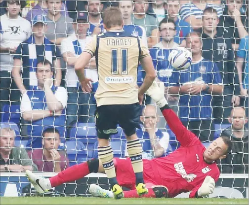  ??  ?? SLICE OF FORTUNE: Luke Varney scores the equaliser for Leeds