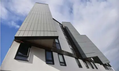  ?? Photograph: Nathan Stirk/Getty Images ?? The Decks residentia­l complex in Runcorn, Cheshire, one of the shorter buildings with cladding that doesn’t qualify for the government’s safety fund.