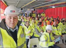  ??  ?? Alasdair Ferguson, director of KPL and Ferguson Transport managing director, welcomed the delegates to the meeting inside a Ferguson lorry inside the dry dock.