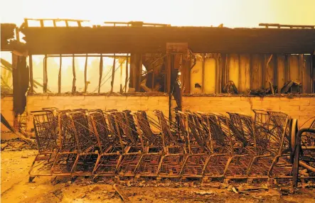  ?? Scott Strazzante / The Chronicle ?? This is what remains of the Safeway store in Paradise that was gutted when the explosive Camp Fire scorched the town.