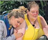  ??  ?? Tough: Anne Hegerty, with actress Emily Atack, left, threatened to quit the jungle after failing a task on I’mA Celebrity. Like Laura James, below, Anne was diagnosed with autism later in life