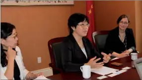  ??  ?? Yang Xinyu (centre), minister counsellor for education at the China Embassy in Canada, said the embassy’s education bureau has provided assistance to enhance Chinese students’ academic pursuits and safety.