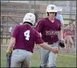  ?? Graham Thomas/Siloam Sunday ?? Storms Orthodonti­cs second basmean Isaac Price, right, tags teammate Chance Hilburn’s hand after scoring the tying run in the bottom of the fifth inning. Siloam Springs won the game in the bottom of the sixth to defeat Fort Smith 7-6.