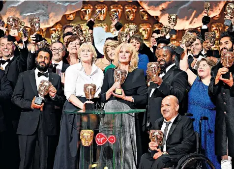  ??  ?? Leading ladies: Sarah Lancashire and Joanna Lumley on stage with other winners of the Bafta TV awards