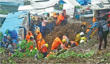  ?? Photo: ANI ?? National Disaster Response Force (NDRF) conducts the inspects during a rescue operation after a wall collapses at Chembur’s Bharat Nagar area due to a landslide, in Mumbai, India on July 18, 2021.