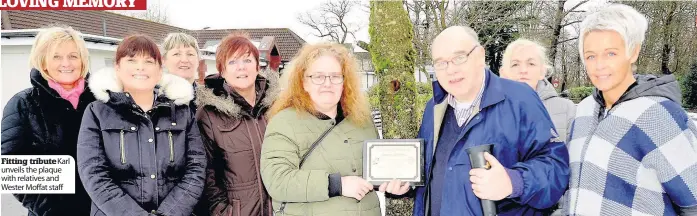  ??  ?? Fitting tribute Karl unveils the plaque with relatives and Wester Moffat staff