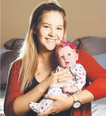  ?? MAGICAL EXPERIENCE: Heatley’s Stacy Munro gave birth to her daughter Allie at the Townsville Birth Centre, which is celebratin­g 10 years of operation. Picture: ZAK SIMMONDS ??