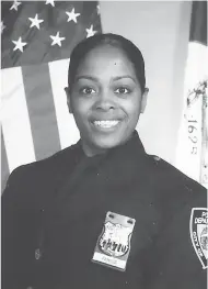  ?? Associated Press ?? NYPD: This undated photo provided by the New York Police Department shows officer Miosotis Familia, who was shot to death early onWednesda­y ambushed inside a command post RV by an ex-convict, authoritie­s said. The gunman was killed by police about a...
