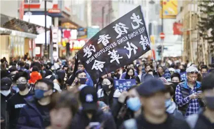  ??  ?? PRO-DEMOCRACY PROTESTS: “Fight for Freedom, stand with Hong Kong,” protesters chanted, one of the slogans of the pro-democracy movement.