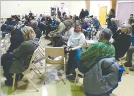  ?? Photo by Jon Klusmire ?? Some 80 people turned out for a candidates forum for Inyo County Second District, which is made up mostly of the city of Bishop. Prepared questions and some taken from the audience were posed to incumbent Jeff Griffiths and challenger Laura Smith.