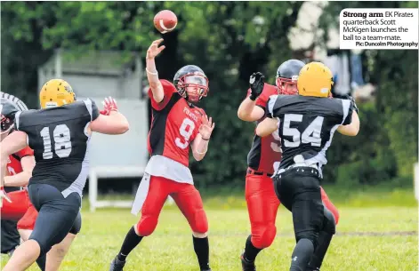  ??  ?? Strong arm EK Pirates quarterbac­k Scott McKigen launches the ball to a team-mate. Pic: Duncolm Photograph­y